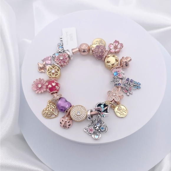 Linx Rose Gold Snake Chain Bracelet with Rose Gold and Yellow Gold Charms